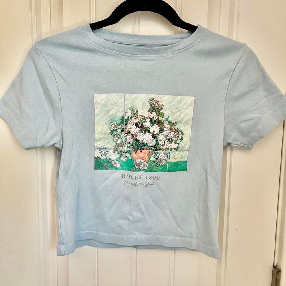 Primark blue cropped top with floral design Size M